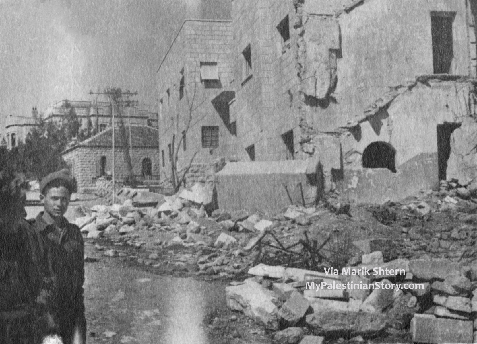 The bombed Semiramis with the Kassotis house in the background. (Photo via Marik Shtern)