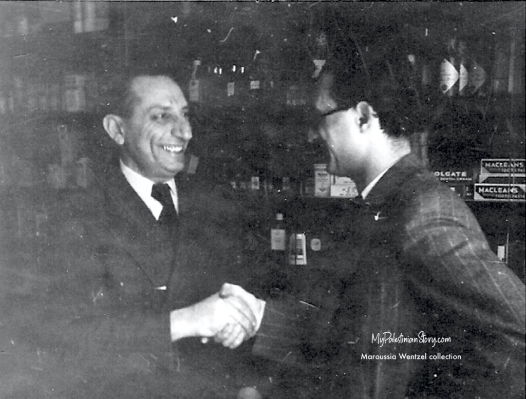 A partnership: Panos Gaitanopoulos (L) and Theodoros Ninos in their Jerusalem pharmacy.
(Maroussia Wentzel photo collection)
